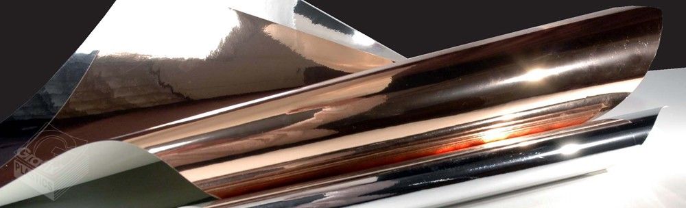 Rolls and sheets of metallized polyester film